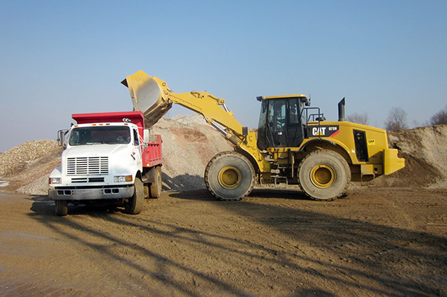 zollinger sand and gravel loading truck